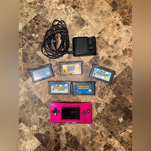 Pink Handheld Nintendo gameboy Micro with 5 games Mario Yoshi charger